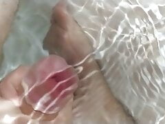 Cumming underwater in the bath SLOW-MO